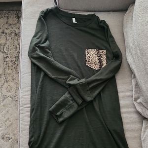 Boutique, green dress with sequenced pocket